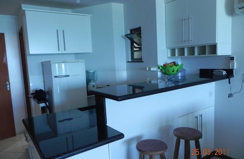 Prainha Apartment | LOFT facing the beach. Swimming pool, sauna, Wi-Fi/garage, all included.