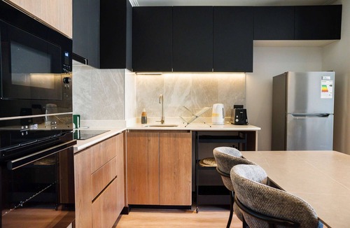 Providencia Apartment | Luxe 2BR Parkside Retreat | Pool and Gym Included