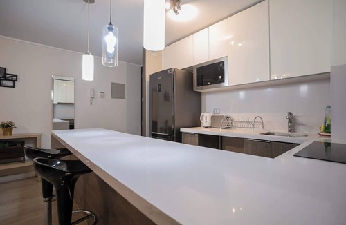 Vitacura Apartment | Luxury 2BR Apartment with Parking and City Views