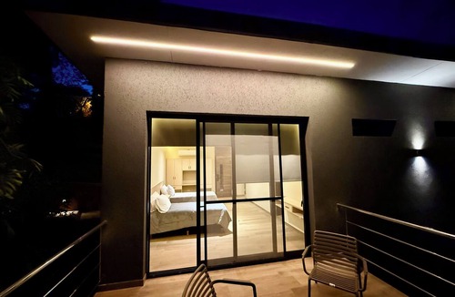 Puerto Iguazu Apartment | Minimalist apartment in the jungle