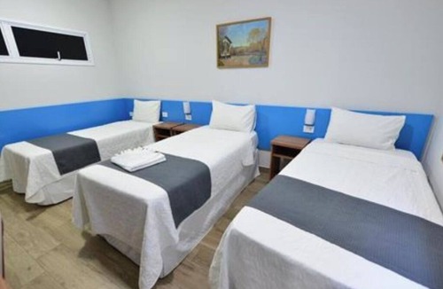 Iguacu Hotel | Minimalist Room for Modern Comfort | Free Breakfast | Ipatingao Stadium - 2.1 mi