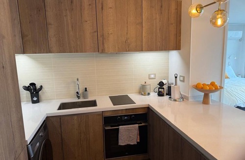 Apoquindo Apartment | Modern apt with king bed, sofa bed, washer/dryer, terrace. Near Parque Arauco.