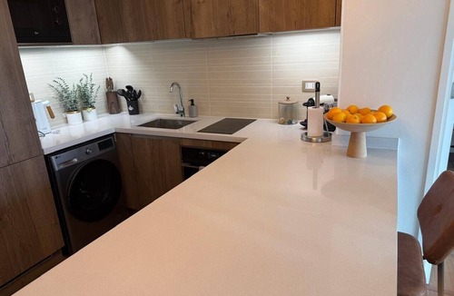 Apoquindo Apartment | Modern apt with king bed, sofa bed, washer/dryer, terrace. Near Parque Arauco.