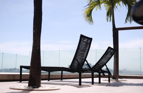 Jatiuca Apartment | Modern studio apartment in Maceió with ocean view, gym, and parking, 200 meters from the beach.