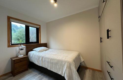 Puerto Aysen House | Moderna y acogedora casa estilo galpón
