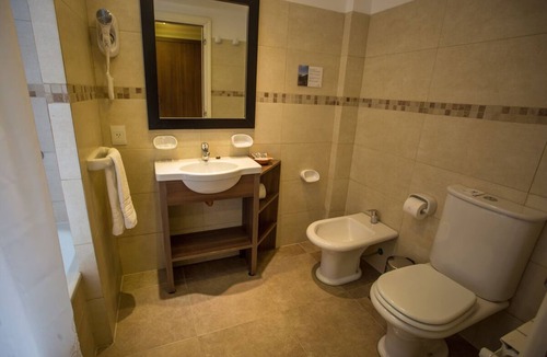 San Carlos de Bariloche Hotel | Relax & Recharge: 2 Family-Friendly Room w/Natural Views, Game Room & Breakfast