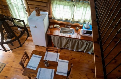 Villa Lia Apartment | Rustic cabin with a pool.
