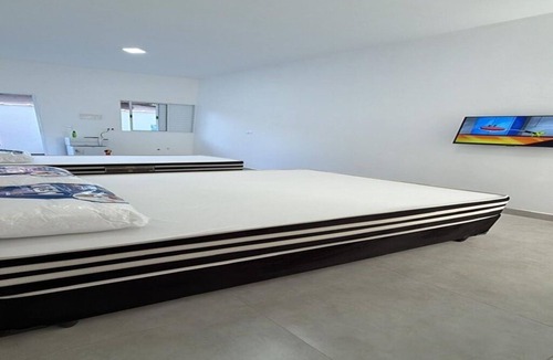 Jardim Rio da Praia Apartment | Studio apartment 5 minutes from Sesc beach in Bertioga-SP. Ideal for 3 people.