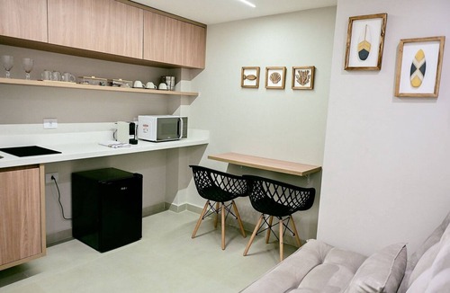 Tesouro da Colina Condo | Studio Castelhanos | Bathtub, pool and an amazing view