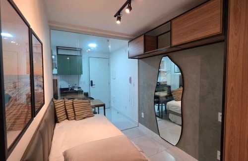 Edson Queiroz House | Studio with industrial style and dune view