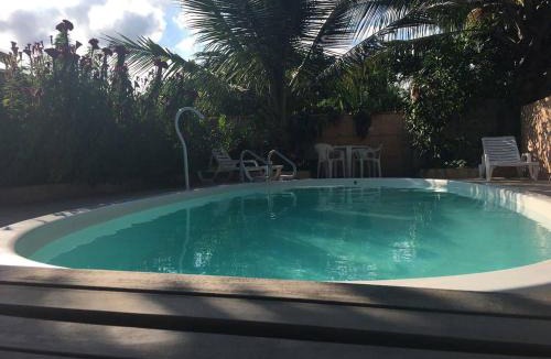 Bairro da Enseada House | Suíte 1 com piscina e wi-fi em Caraguatatuba