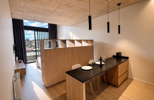 San Martin de los Andes Apartment | Suite Patagonia Studio · Brand-new boutique apartment with mountain views and a balcony | Ski in winter; trekking, fishing, and kayak in summer