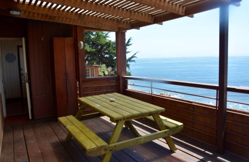 Concon House | The Brown House, in front of the Ocean next to the beach and waves at La Boca