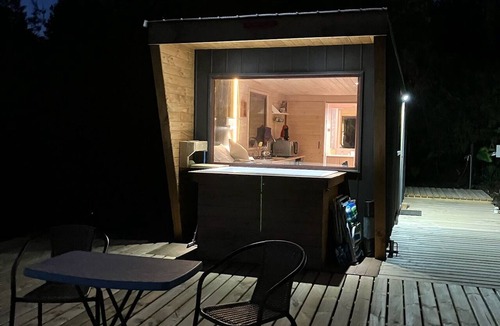 Calbuco Cabin | Tiny House with Ocean View and a Water Jar