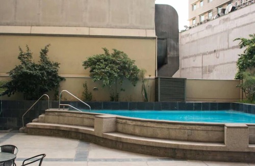 Downtown Santiago Apartment | Warm 1 bedroom apt. 1 bedroom apartment half a block from Sta. lucia subway station.