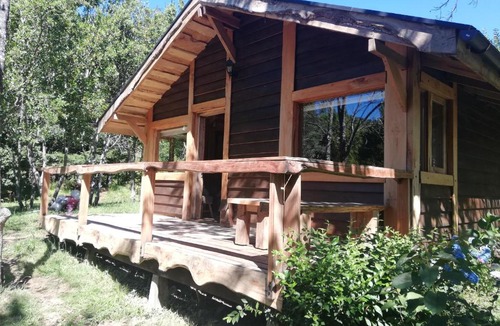 Pucon House | Wonderful rustic cabin 2, with native logs, on the banks of the Trancura River