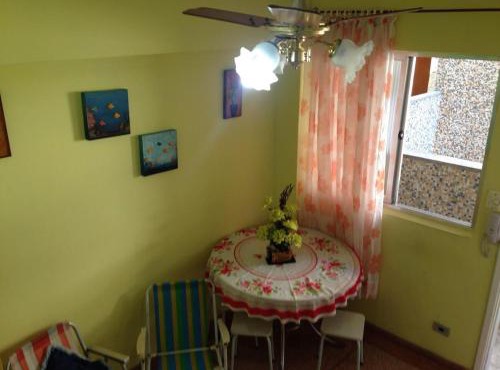 Apartamento Praia Grande, Vila Tupi, em frente ao mar, com retirada de chaves na casa da proprietária in Praia Grande