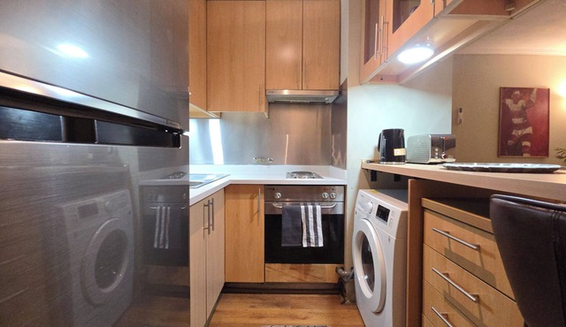 Apartment in Providencia, with view to the mountain range. in Providencia