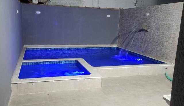 Beach house with pool and hot tub: A retreat to relax with the family! in Peruíbe