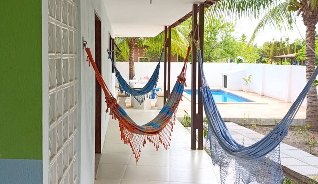 Beach, pool and barbecue with tranquility and privacy a hundred meters from the sea! in Enseada dos Golfinhos Ilha de Itamaracá
