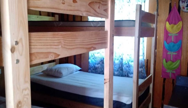 Cabin in front of the Caburgua's eyes