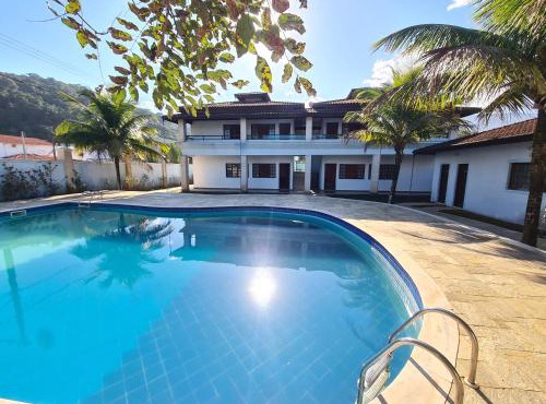 Chalés individuais com piscina a 500M da praia in Massaguassu