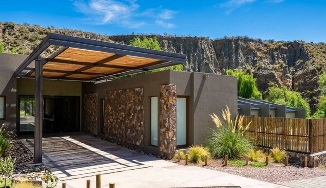 Family Room with River, Mountain, Spa, and Pool Views