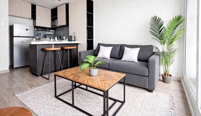 Modern, centrally located apartment steps from the Movistar Arena
