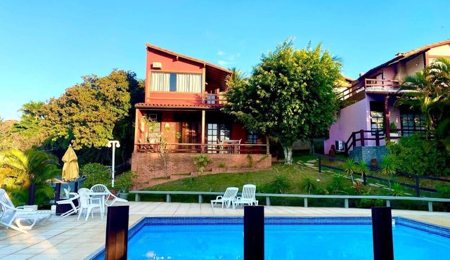 Modern loft 5 minutes from Geribá with a balcony, grill, and pool—pets welcome! in Armação dos Búzios