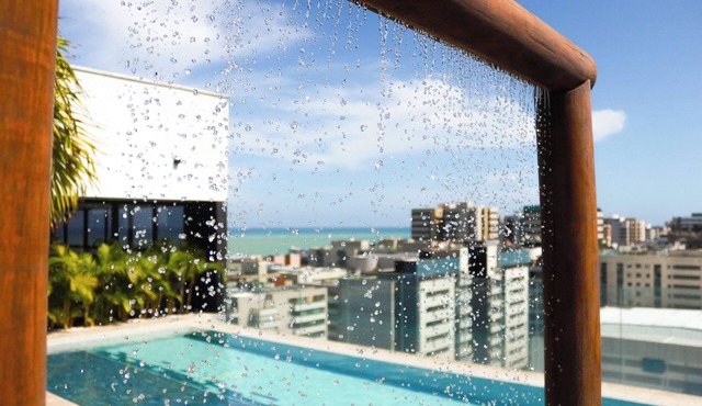 Modern studio apartment in Maceió with ocean view, gym, and parking, 200 meters from the beach. in Maceió