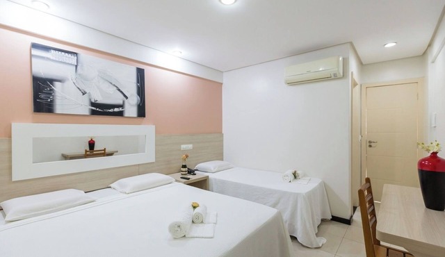Modern Triple Room in Centro | Walk to Local Stores, Free Breakfast & Parking in Eunápolis