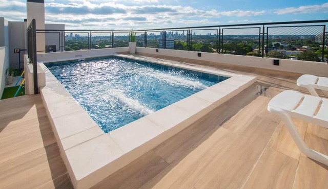 Peaceful Stay with Rooftop Pool Access in Fernando de la Mora