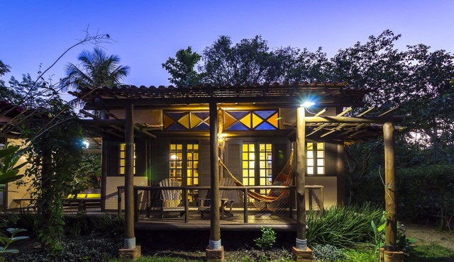 Property with a pier for small boats that offer tours to the islands. in Paraty