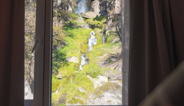 Rest with the best view of the waterfall I Ayres del Bosque Accommodations
