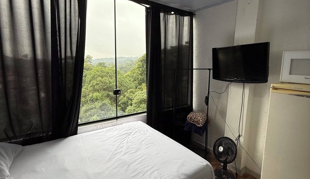 Studio apartment with forest view, 20 minutes from São Paulo city. in Caieiras