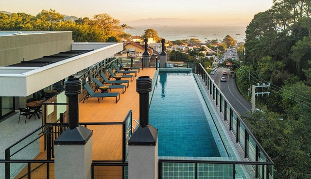 Studio Saint Garden - Sunset - Swimming pool with ocean view - Gastronomy in Florianópolis