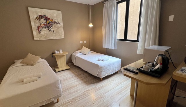 Two Downtown Executive Double Twin Room for Relaxing Stays and Urban Exploration in Paraná