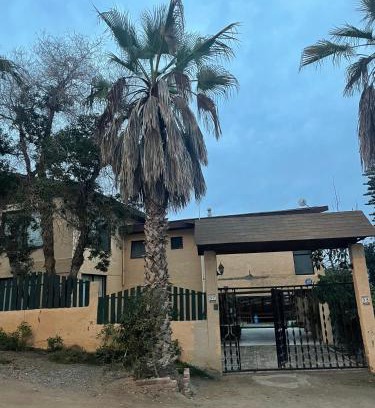 Guanaqueros Hostel | Casa Guanaqueros para 12 personas con 5 habitaciones
