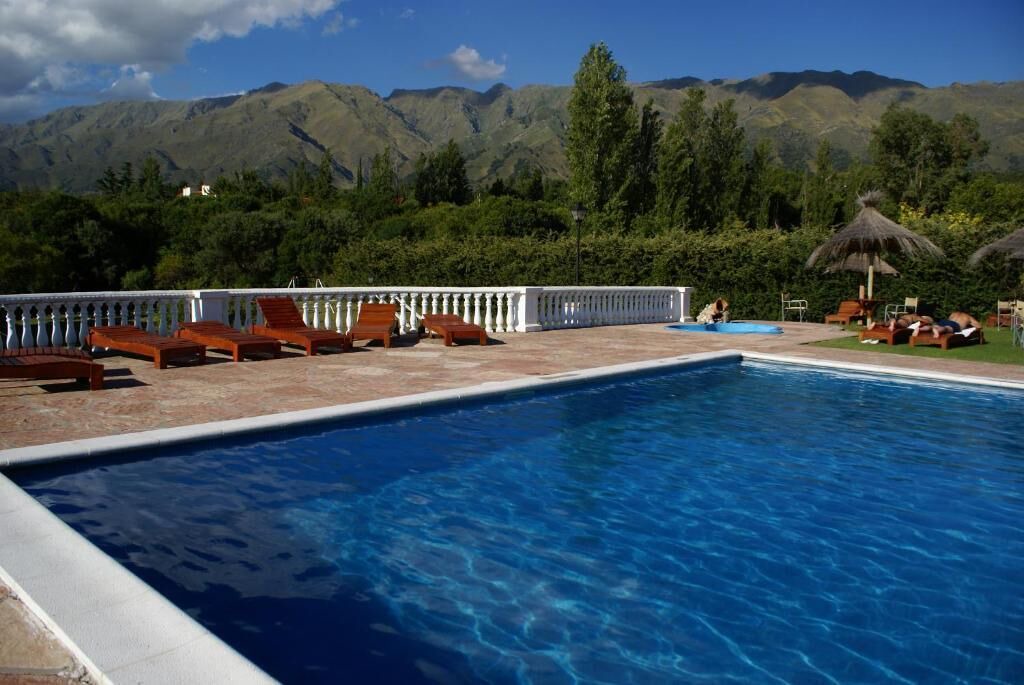 Merlo Hotel | El Cortijo Apart - Hotel