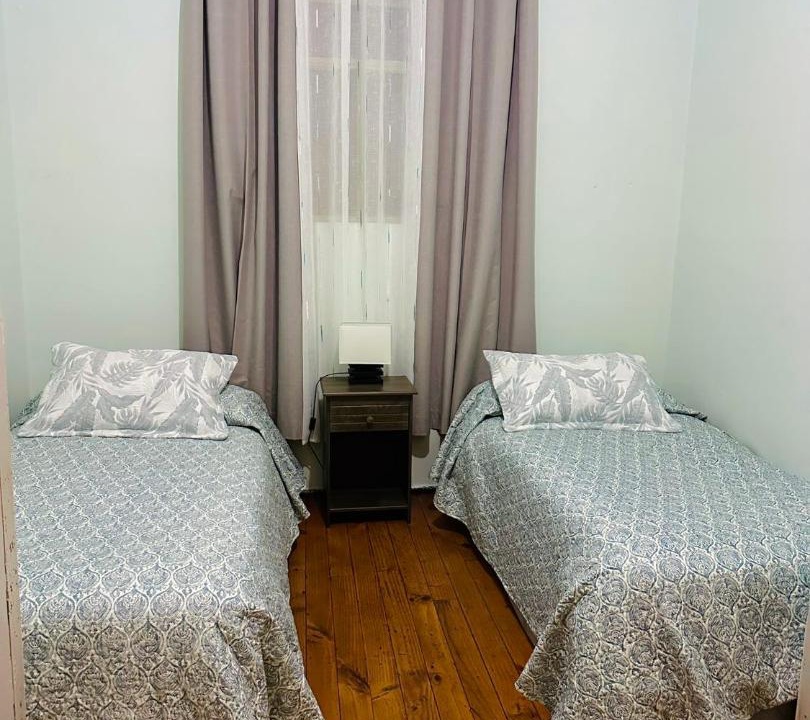 Angol House | Hostal y Hospedaje El Vergel