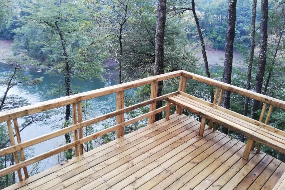 Pucon House | Wonderful rustic cabin 2, with native logs, on the banks of the Trancura River