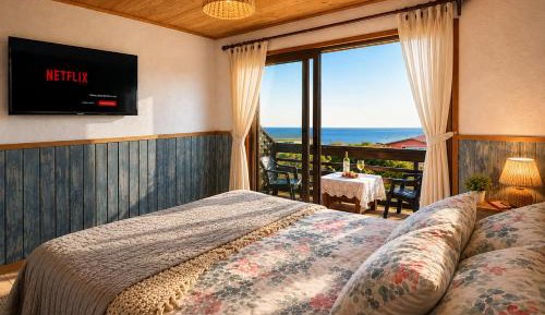 Deluxe Double Room with Side Sea View