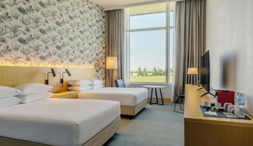 Queen Room with Two Queen Beds and Garden View - Club Level