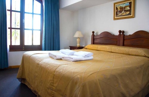 Merlo Hotel | El Cortijo Apart - Hotel