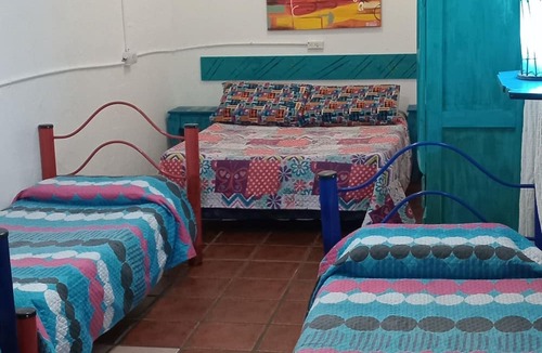 Flores Hotel | Hospedaje La Rana