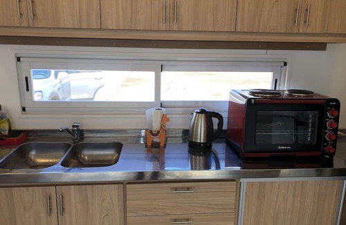 Cafayate House | Container House in a Very Quiet Neighborhood Surrounded by old Carob Trees