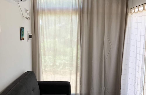 Cafayate House | Container House in a Very Quiet Neighborhood Surrounded by old Carob Trees