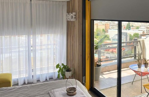 San Salvador de Jujuy Apartment | Cercano al centro de la ciudad pero en un barrio tranquilo, rodeado de árboles.