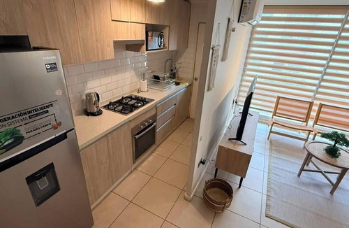 Linares Apartment | Just a short walk from the shopping center—ideal for families, couples, or business trips.