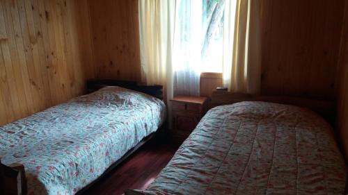 Quellon House | Cabanas Neptuno